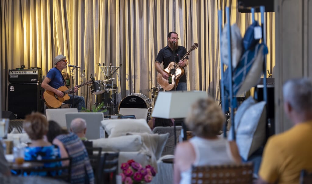 Performers on Stage in August Haven Showroom