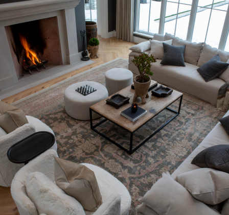 angled shot looking down into a living room setting with fireplace