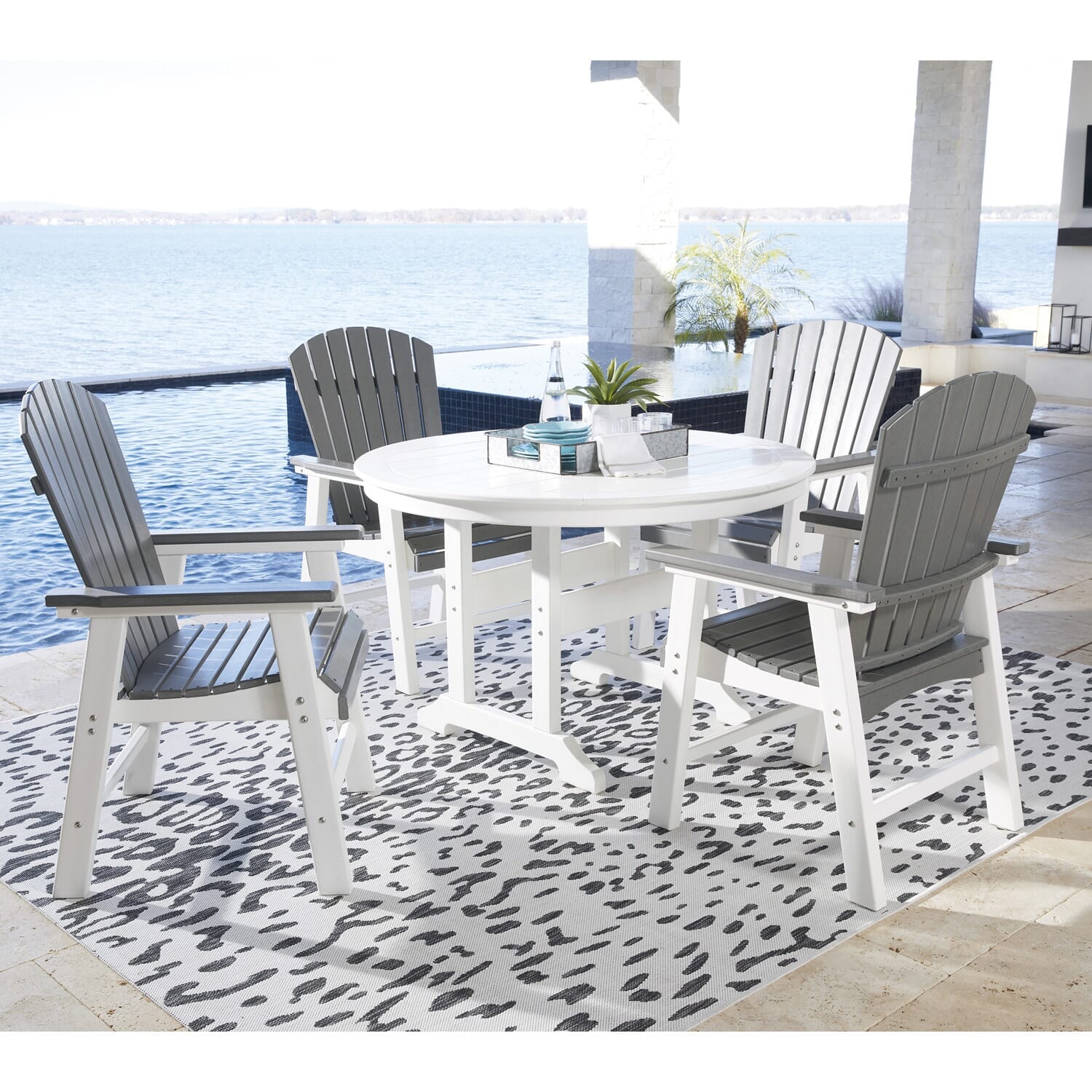 5-pc. Breezy Outdoor Seating Collection overlooking a lake on a sunny day