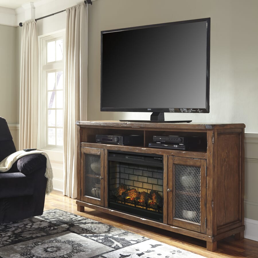 TV stand with fireplace console, shelves and cabinets, and a TV on top