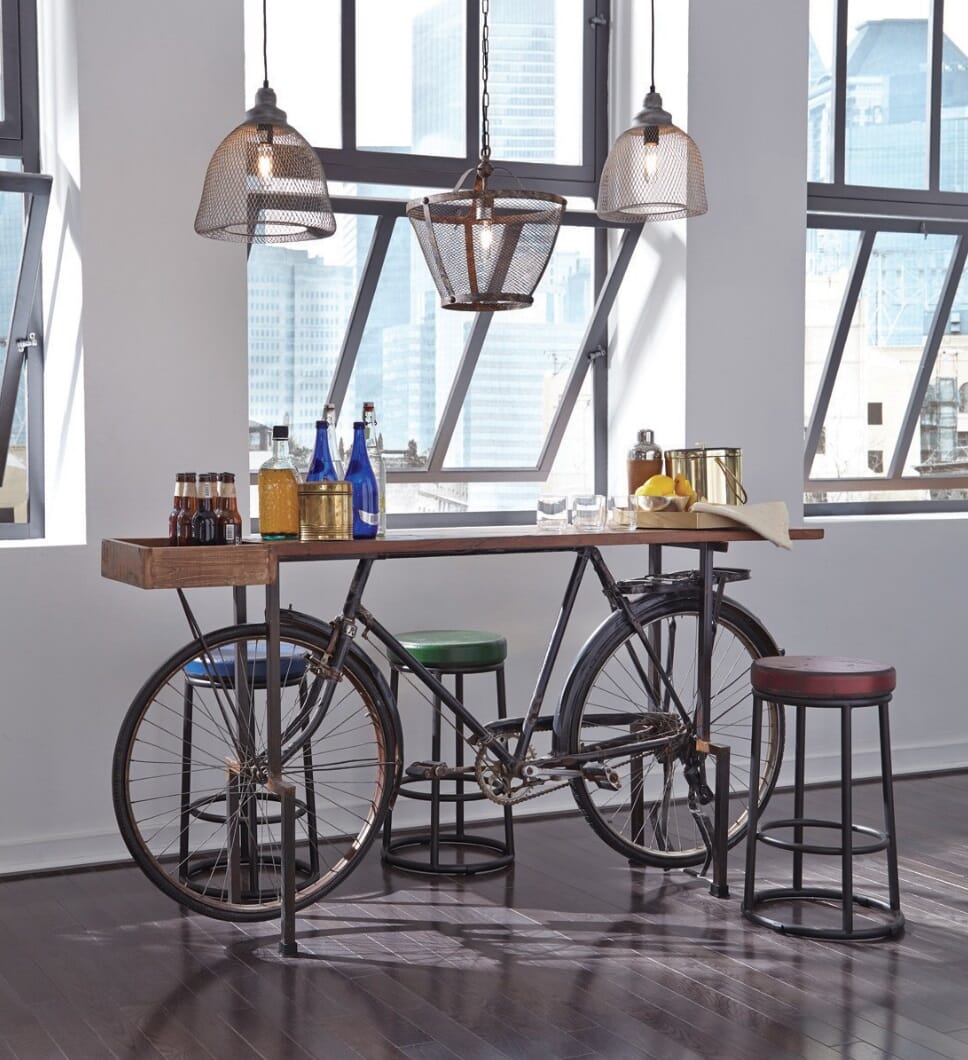 bicycle bar table in home with colorful stools