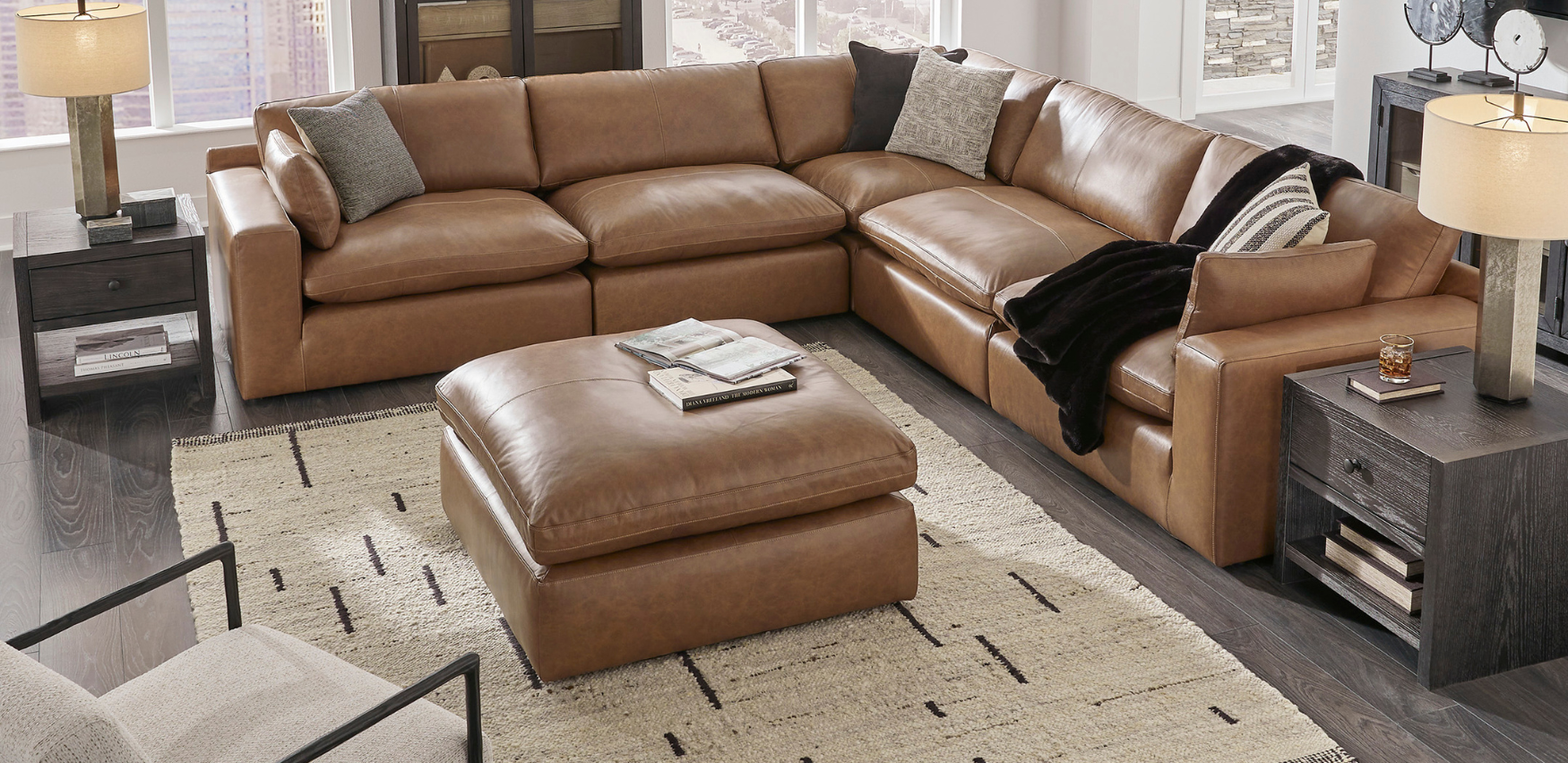 Brown leather sectional with ottoman living room lifestyle